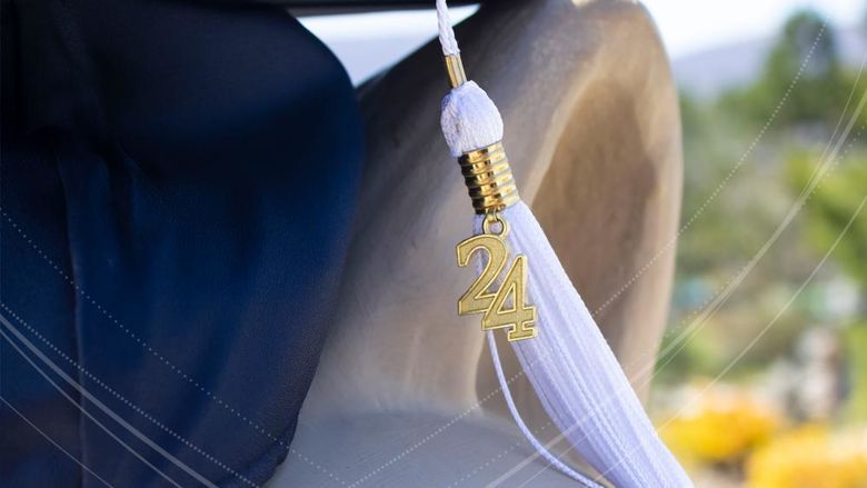Image of a graduation cap with tassel showing 2024