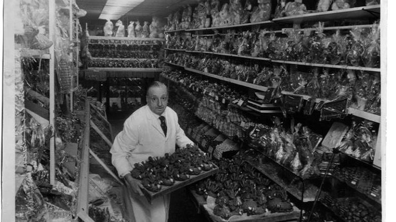 original owner stocking shelves in original Dunmore Candy Kitchen store